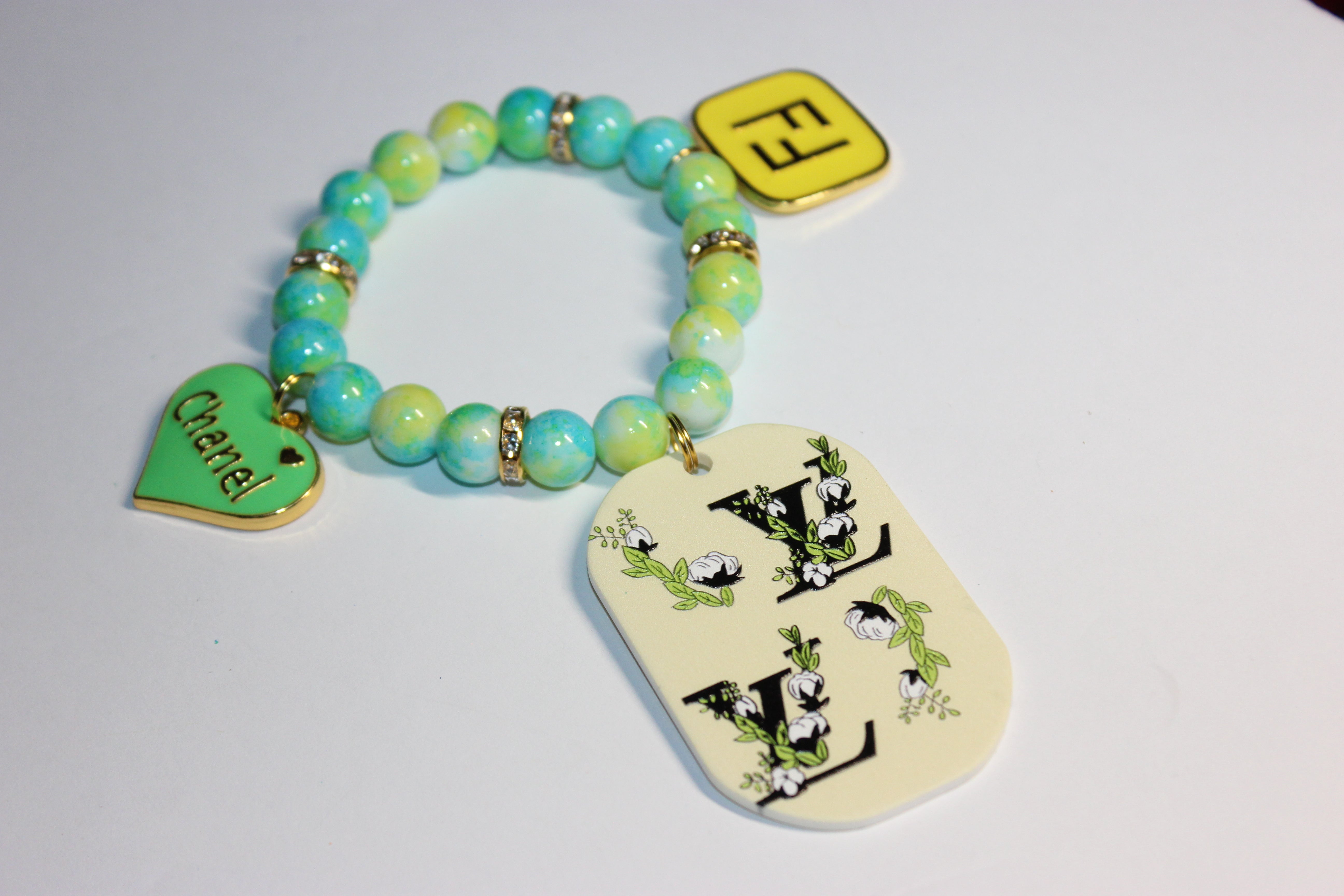 Shi’Len Charm Bracelet (1) w/ Gold