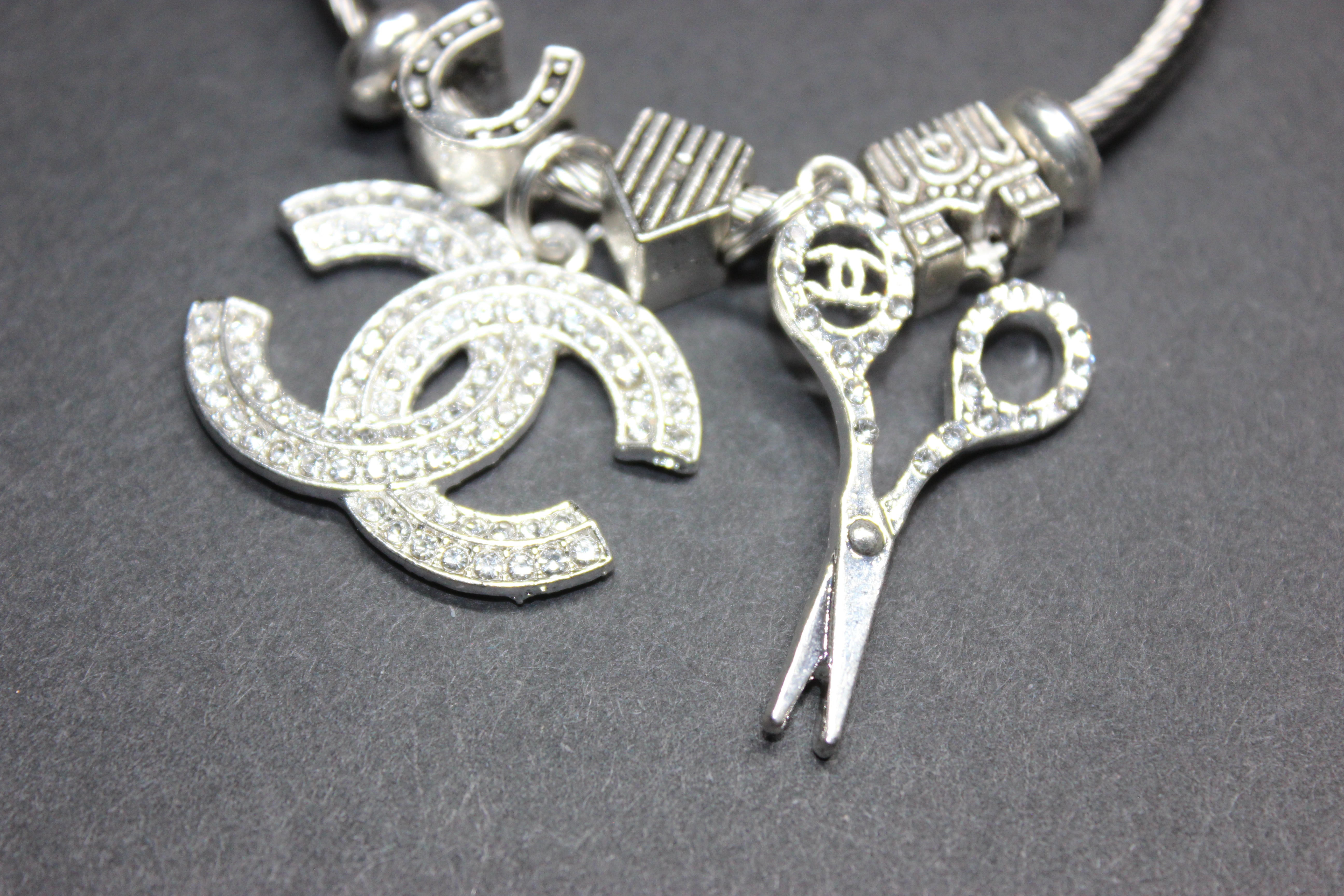 Anesidora Silver Charm Bangle Bracelet