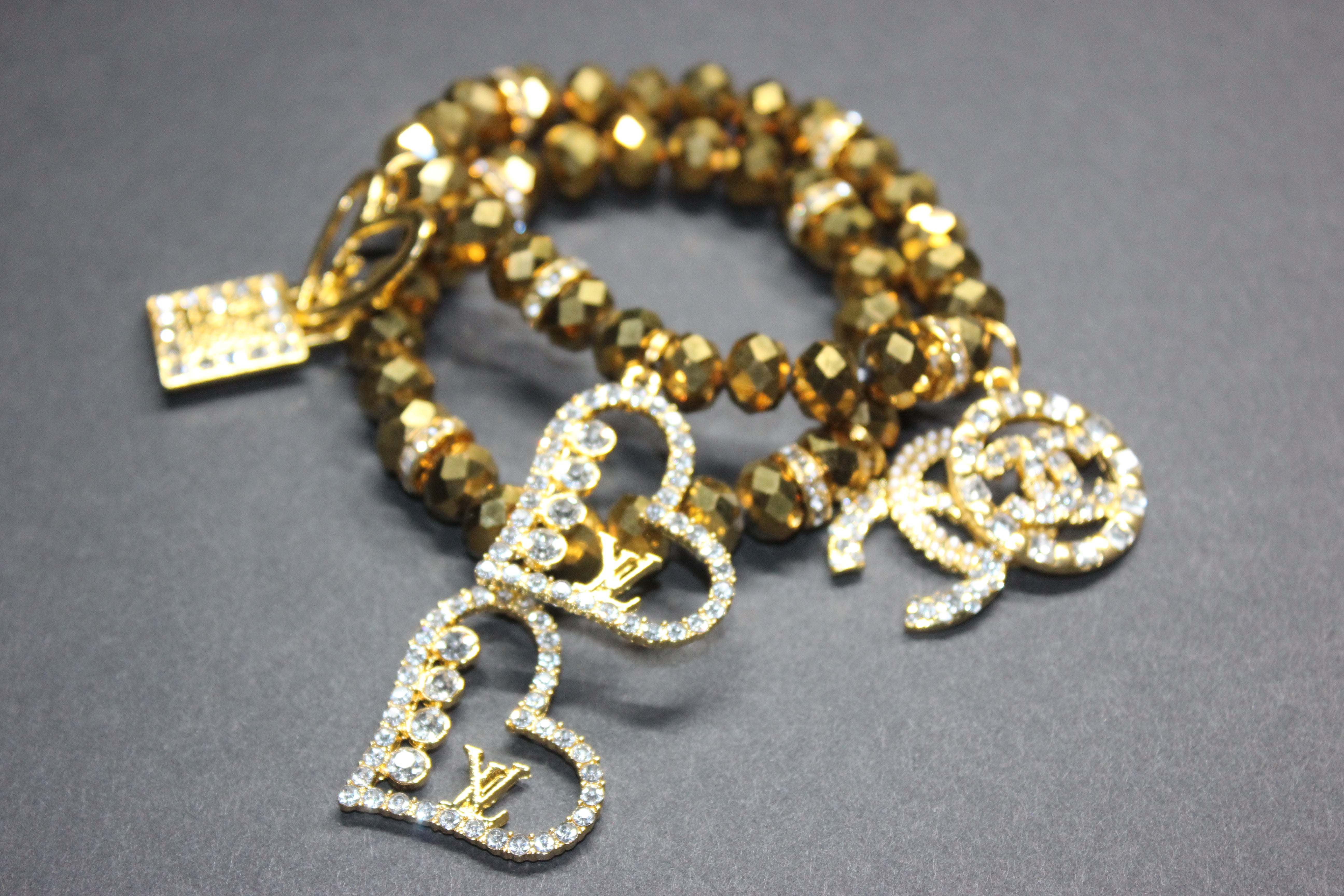 2 Piece Gold Crystal Charm Bracelet Set
