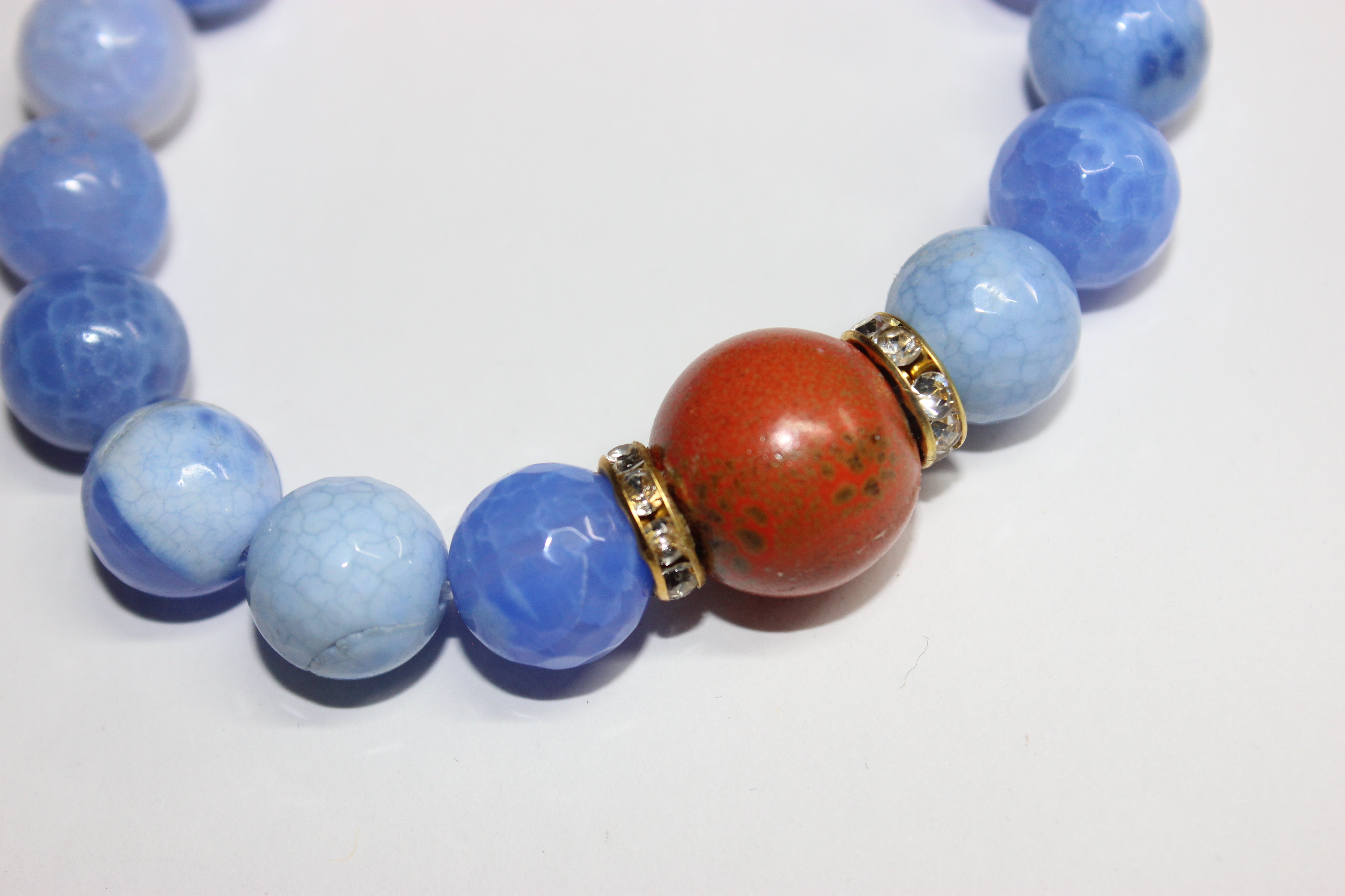 Shades Of Blue & Orange Beaded Bracelet Set In Gold
