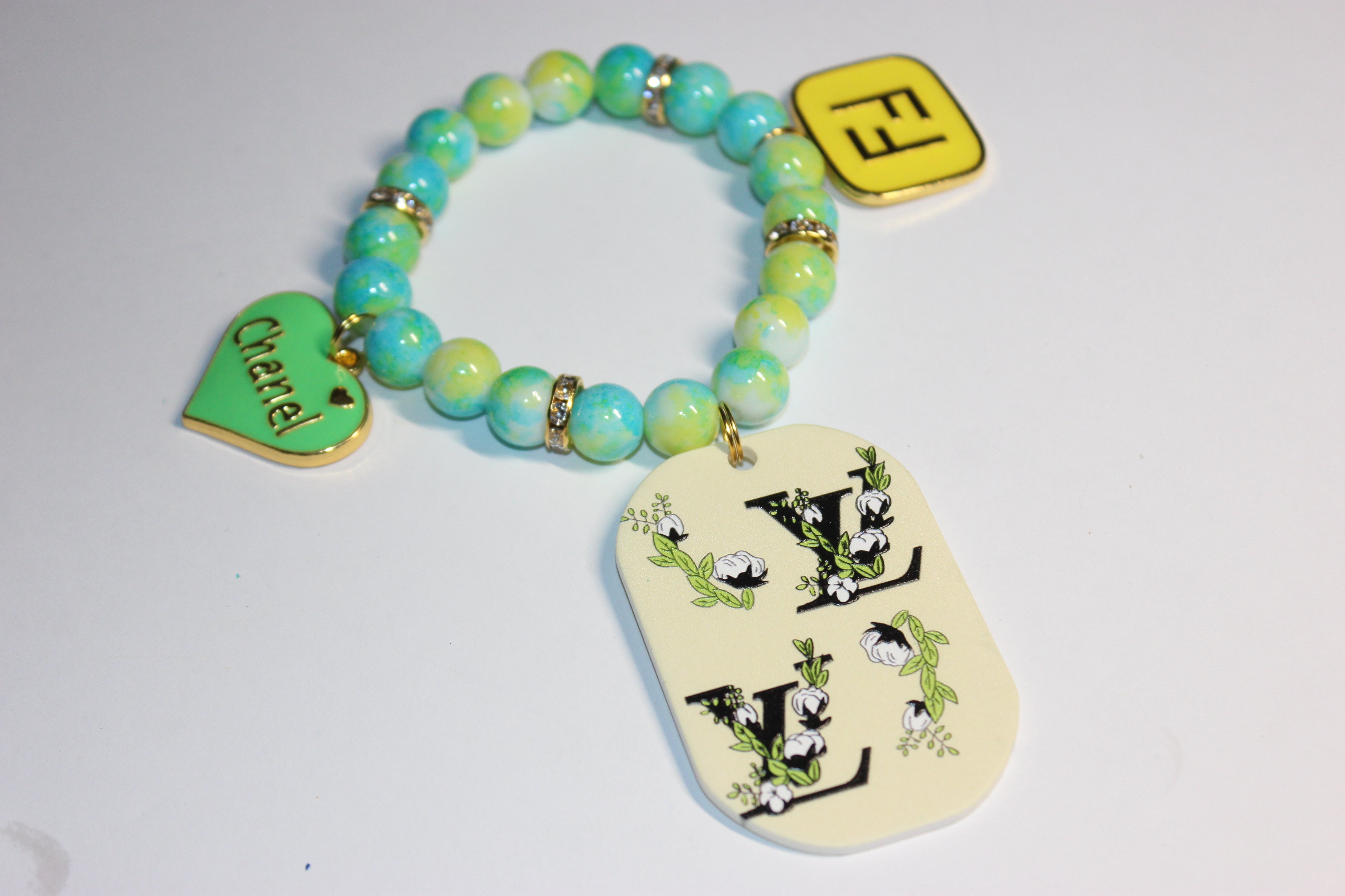 Shi’Len Charm Bracelet (1) w/ Gold