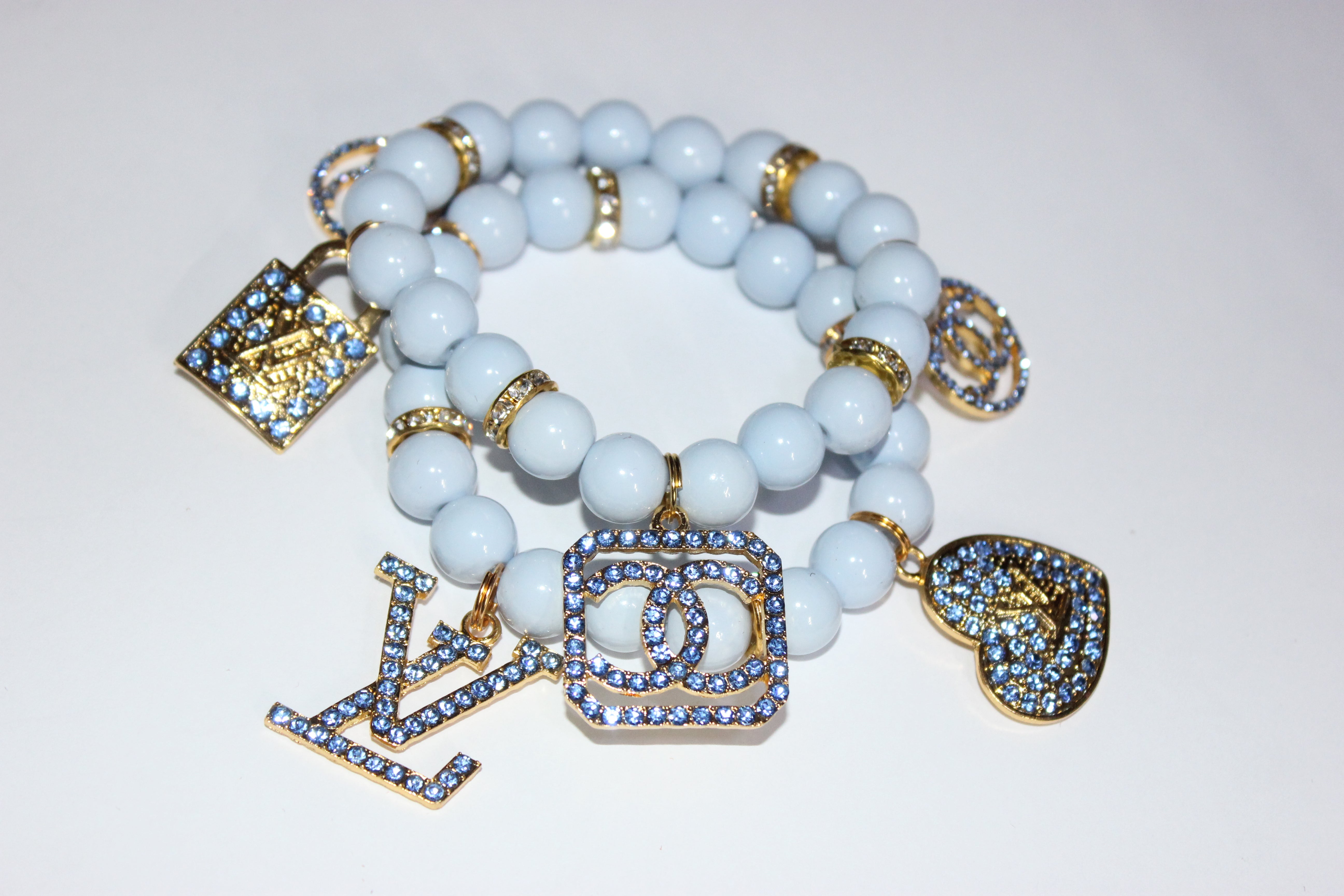 2 Piece Shades Of Light Blue & Gold Charm Bracelet Set