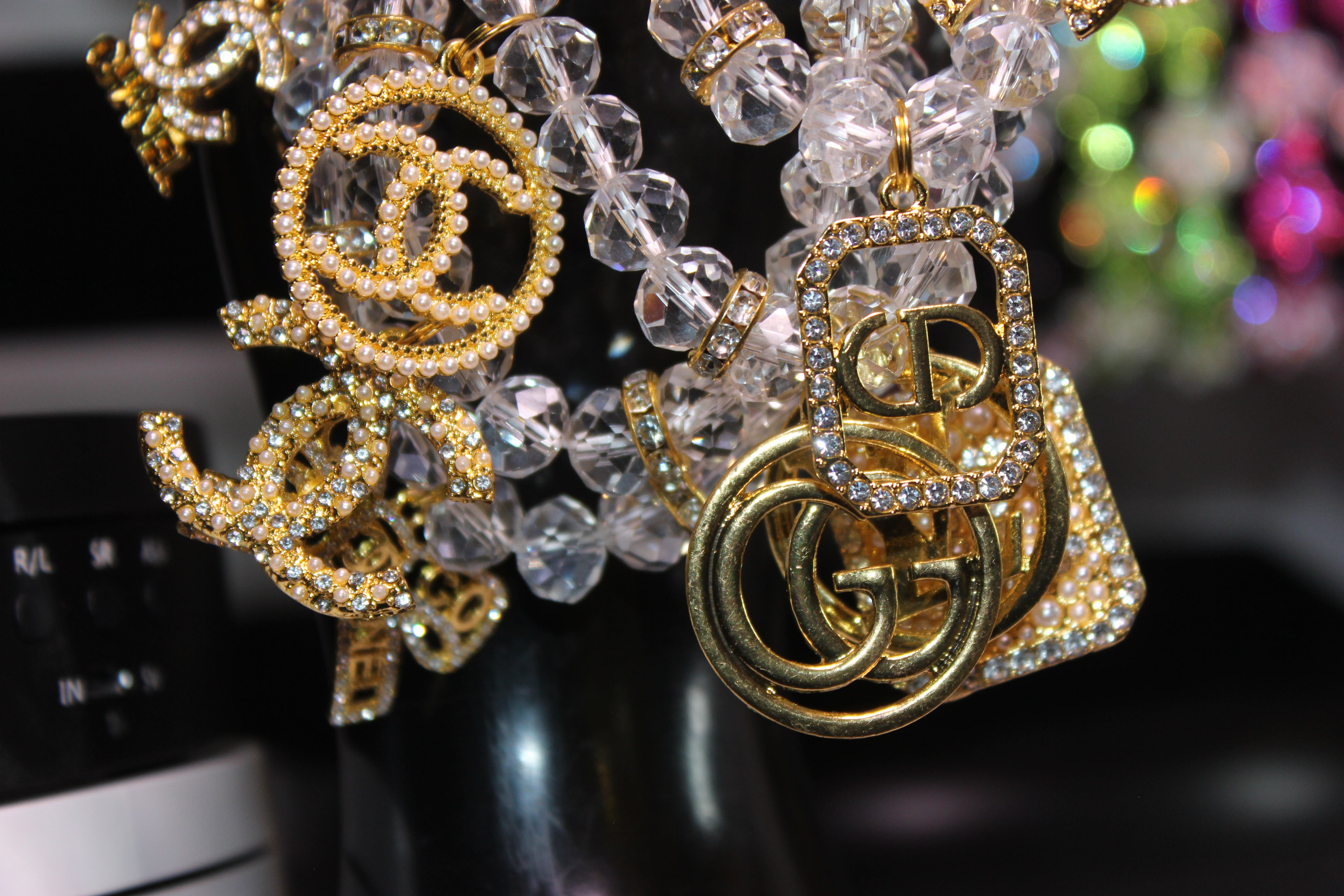 4 Piece Gold & Clear Crystal Charm Bracelet Set with Rhinestone Charms.