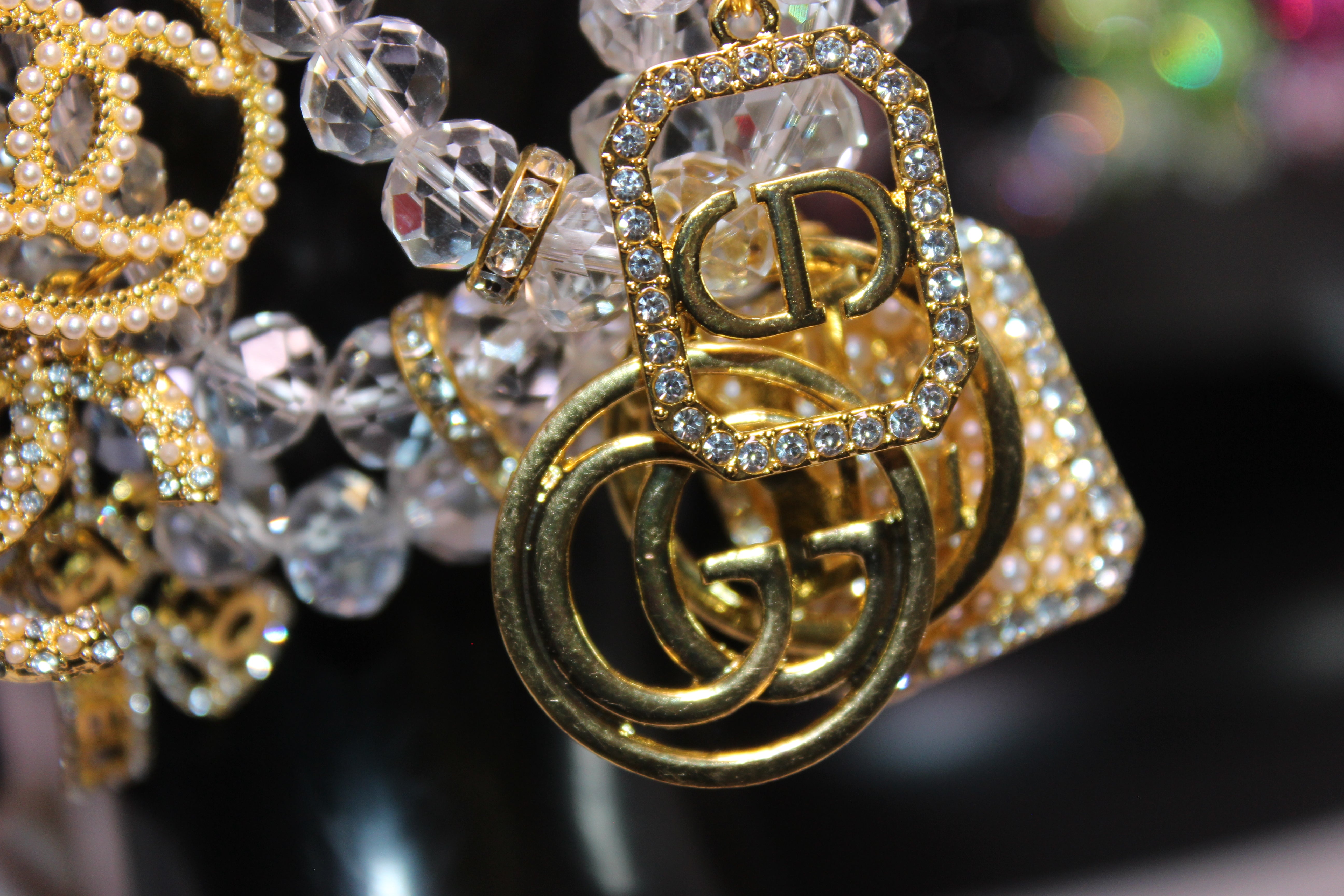 4 Piece Gold & Clear Crystal Charm Bracelet Set with Rhinestone Charms.