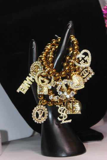 Gold 4 Piece Charm Bracelet Set