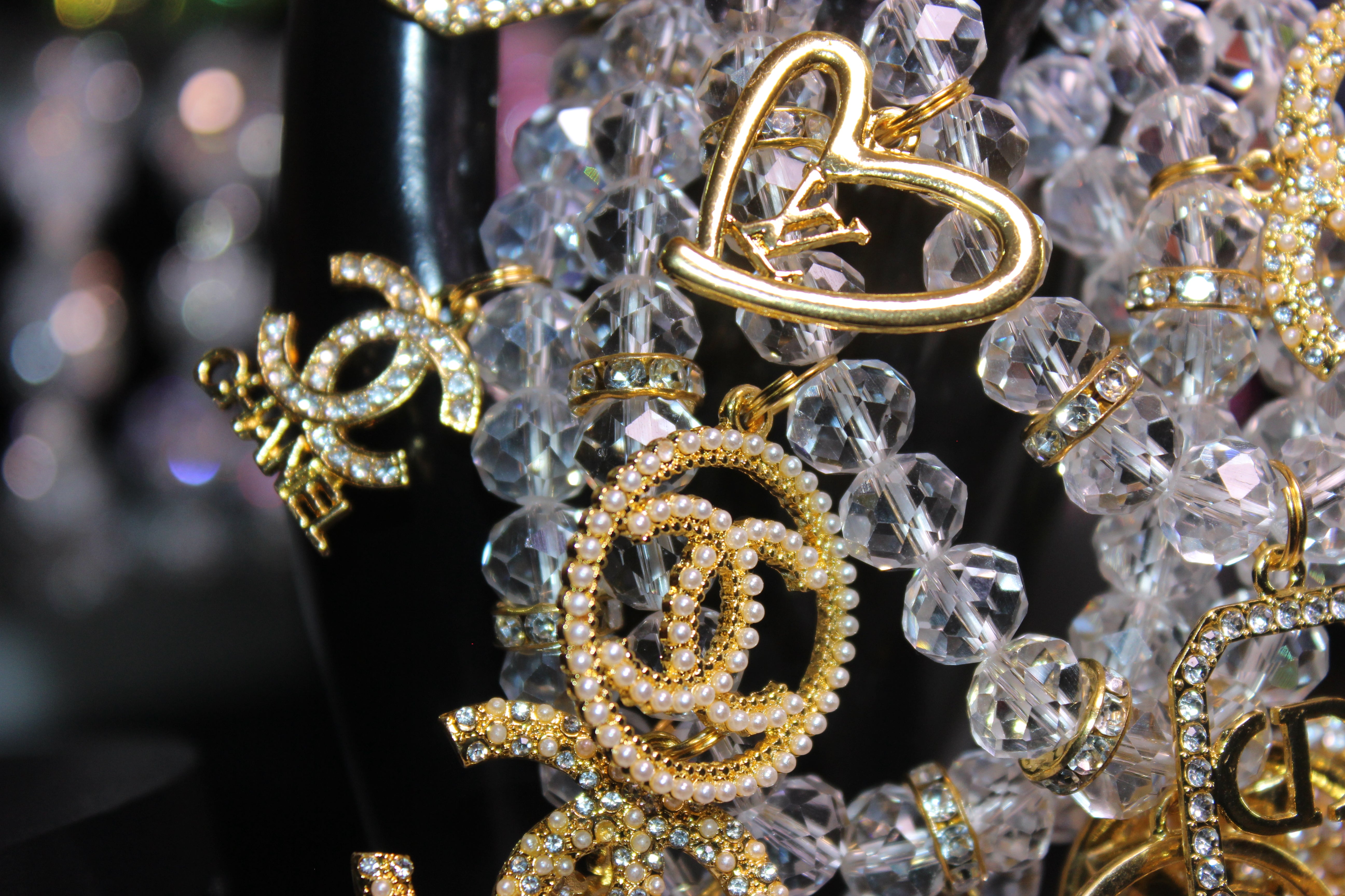 4 Piece Gold & Clear Crystal Charm Bracelet Set with Rhinestone Charms.