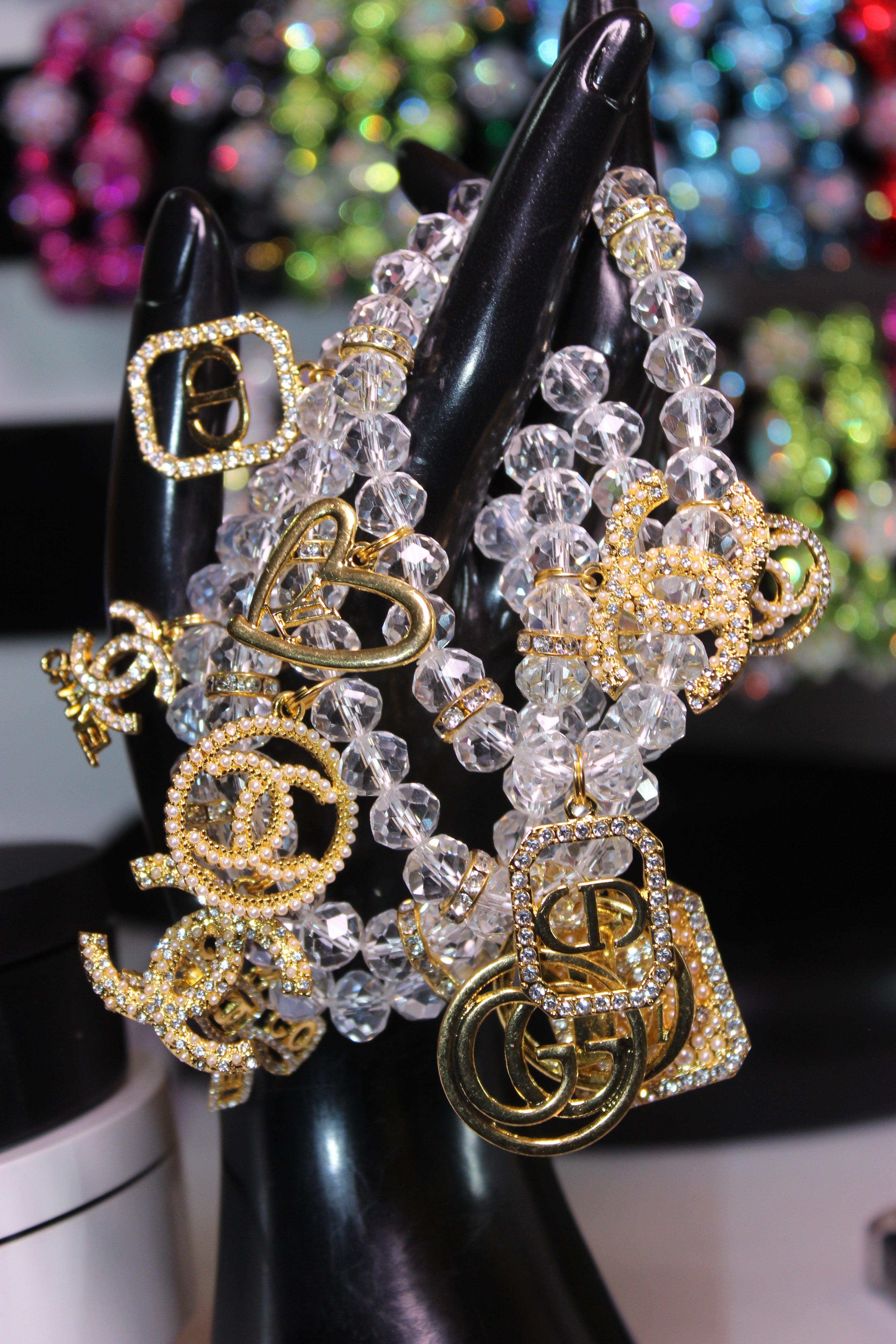 4 Piece Gold & Clear Crystal Charm Bracelet Set with Rhinestone Charms.