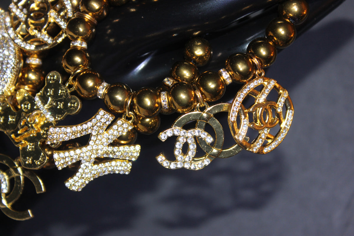 2 Piece Sìrai Gold Charm Bracelet Set