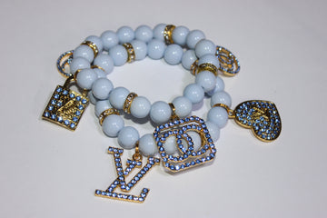 2 Piece Shades Of Light Blue & Gold Charm Bracelet Set