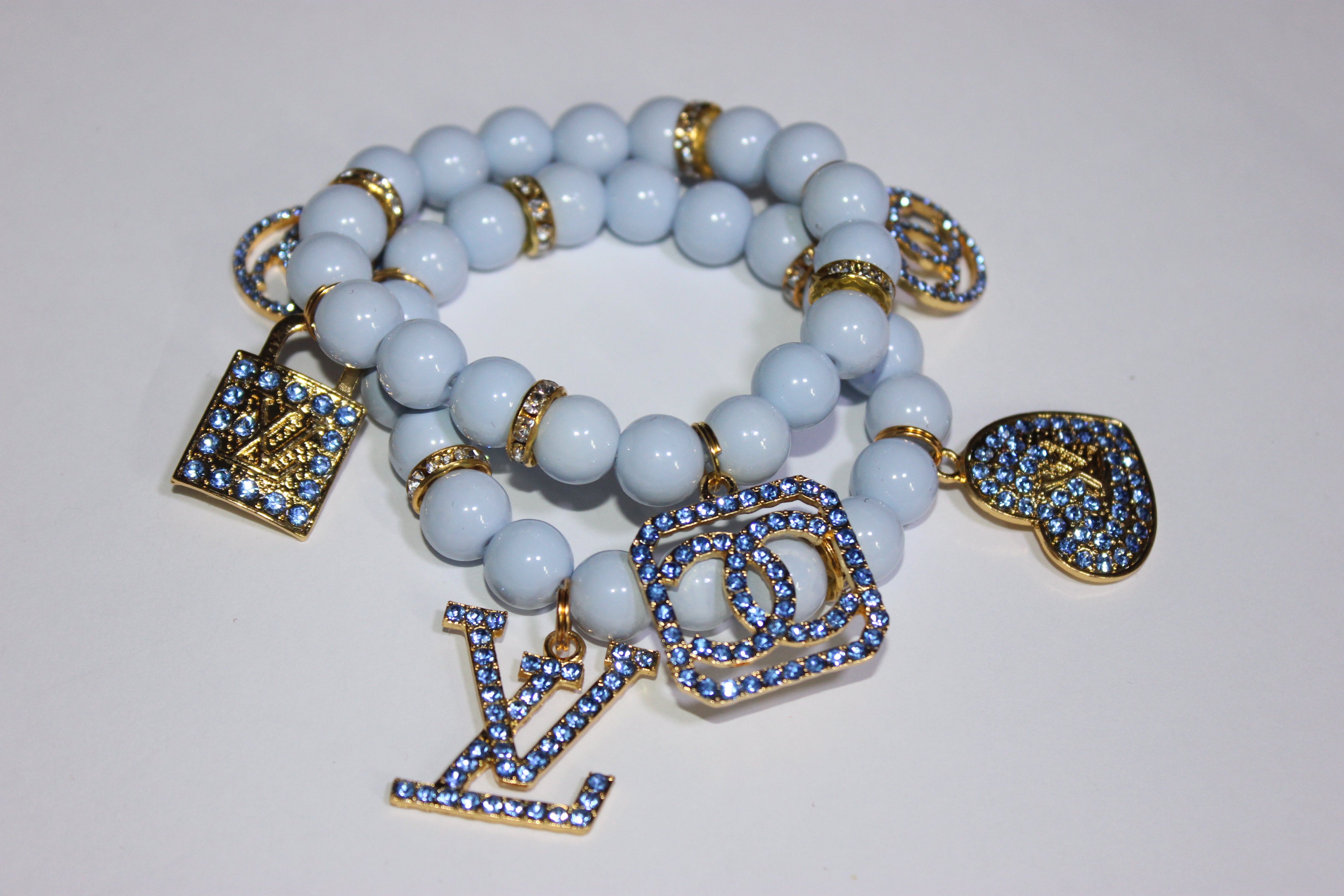 2 Piece Shades Of Light Blue & Gold Charm Bracelet Set