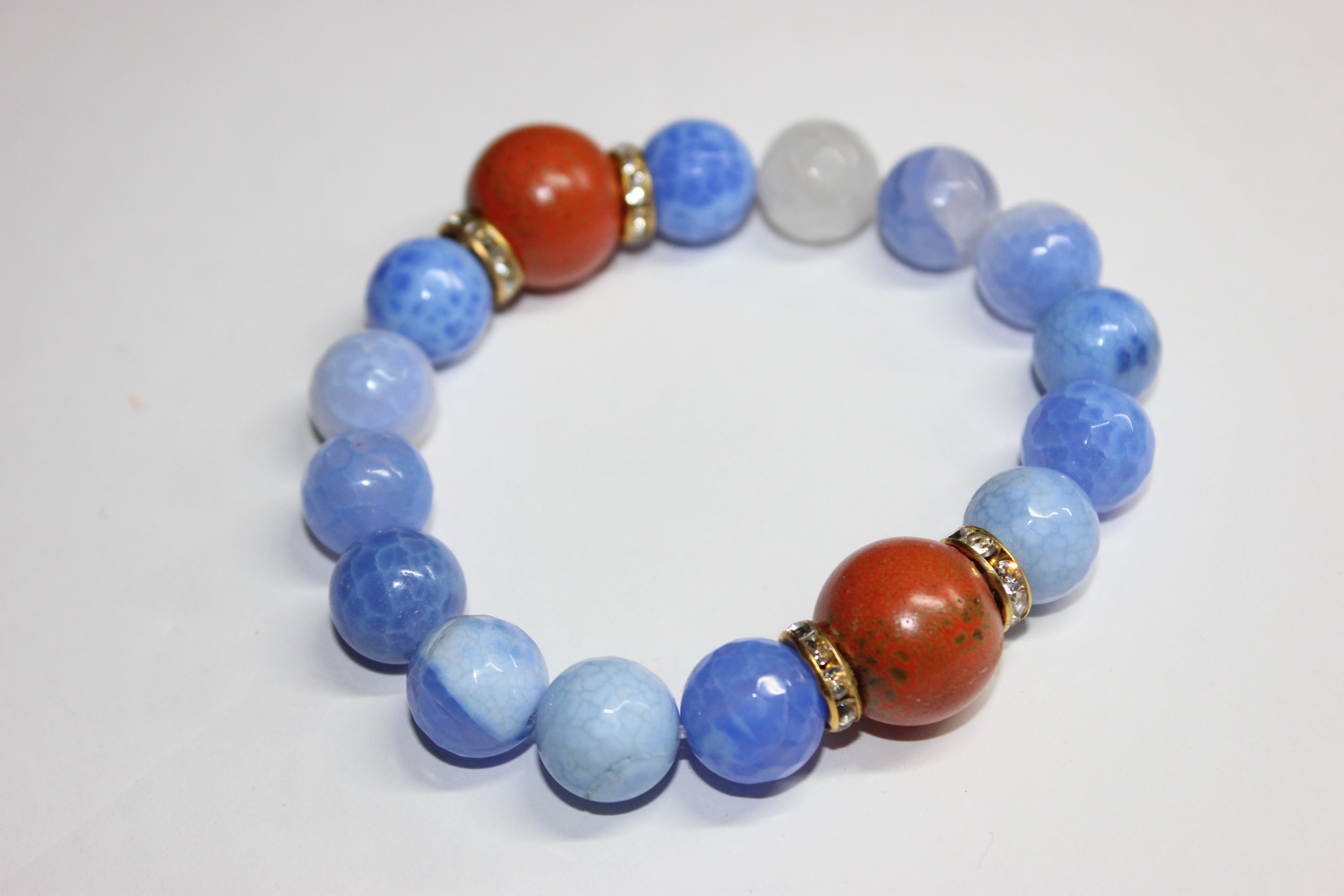 Shades Of Blue & Orange Beaded Bracelet Set In Gold
