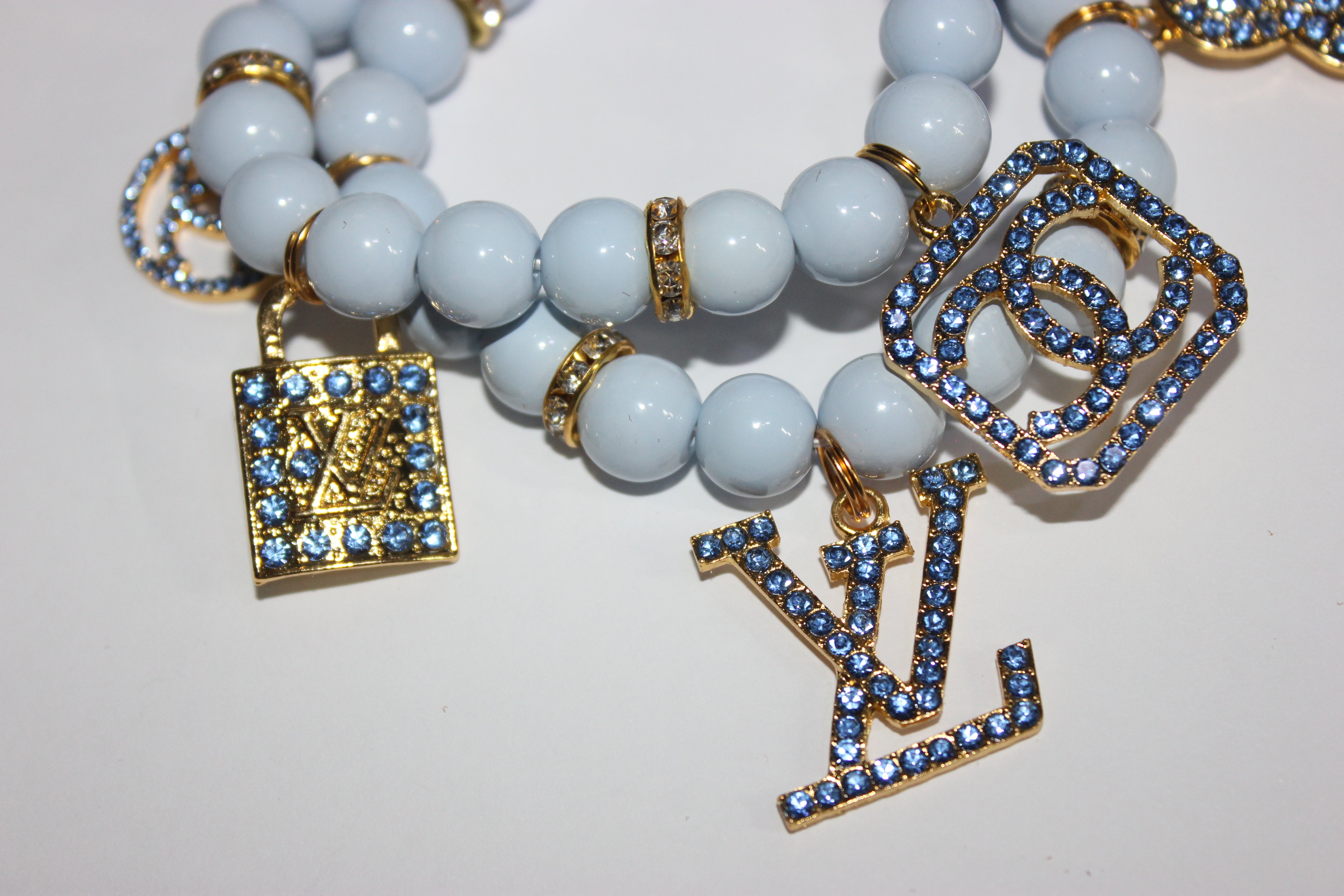 2 Piece Shades Of Light Blue & Gold Charm Bracelet Set