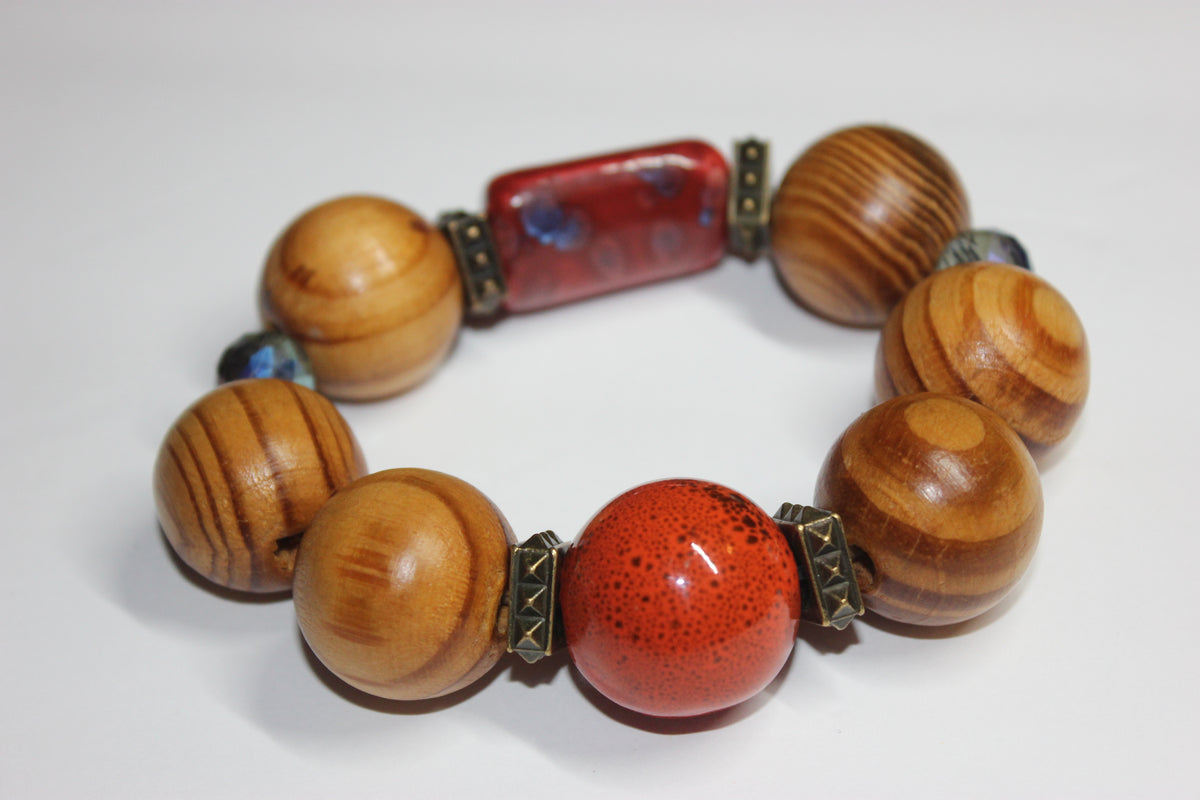 Large Wooden & Shades Of Orange Beaded Bracelet