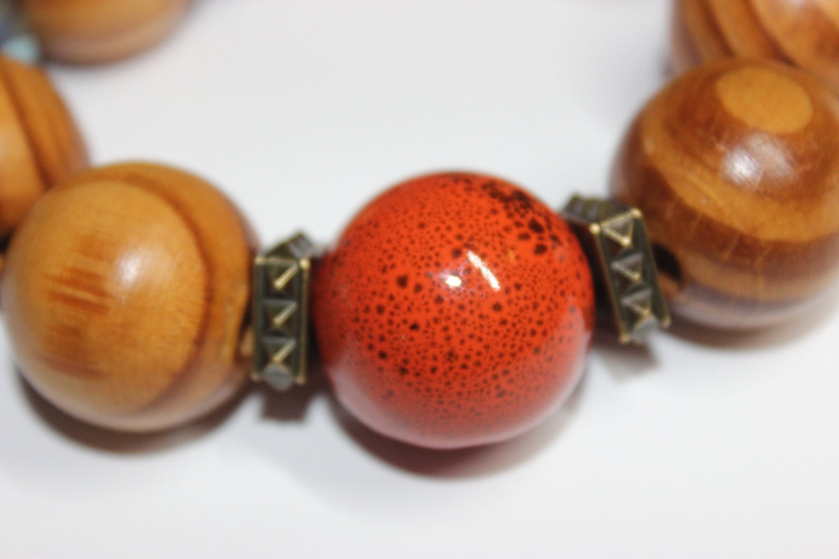 Large Wooden & Shades Of Orange Beaded Bracelet