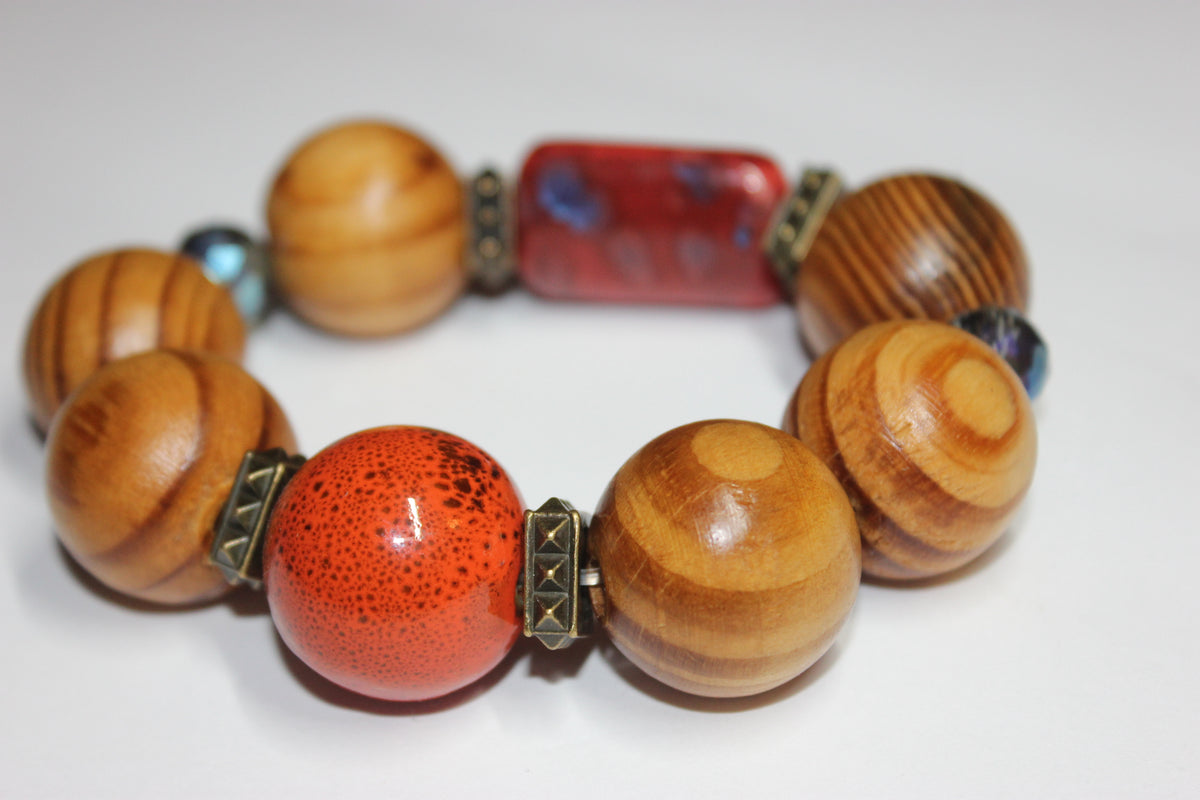 Large Wooden & Shades Of Orange Beaded Bracelet